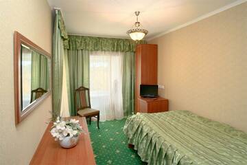 Фото номера Стандартный одноместный номер Гостиница Домик у причала г. Ломоносов 2