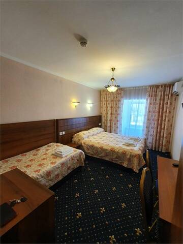 Фото номера Стандартный трехместный номер Гостиница Домик у причала г. Ломоносов 4