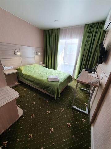 Фото номера Стандартный одноместный номер Гостиница Домик у причала г. Ломоносов 4