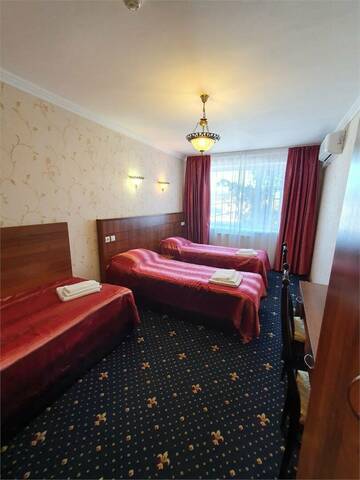 Фото номера Стандартный трехместный номер Гостиница Домик у причала г. Ломоносов 2